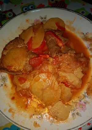 Una foto de Bifes a la criolla con papas