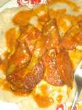 Domplin con salami guisado al estilo dominicano