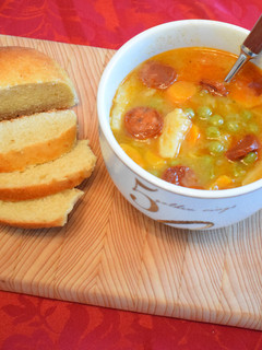 A picture of Pea Soup with pepperoni.