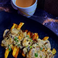 A picture of Cheesy Mushroom French Fries.