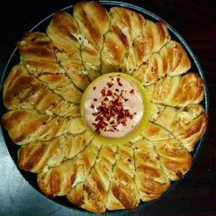 A picture of Spicy, Cheesy, Buttery Italian Layered Bread Twists.