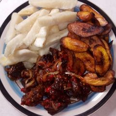 A picture of Fried yam/plantain n pepper meat.