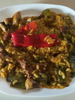 Una foto de Arroz meloso con secreto de cerdo y verduras