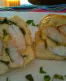 Rollos de pechuga de pollo relleno de langostino y espinacas
