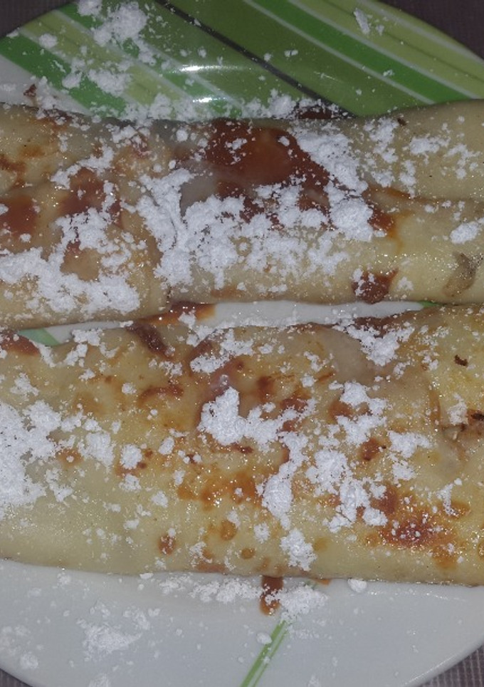 Una foto de Panqueques con dulce de leche