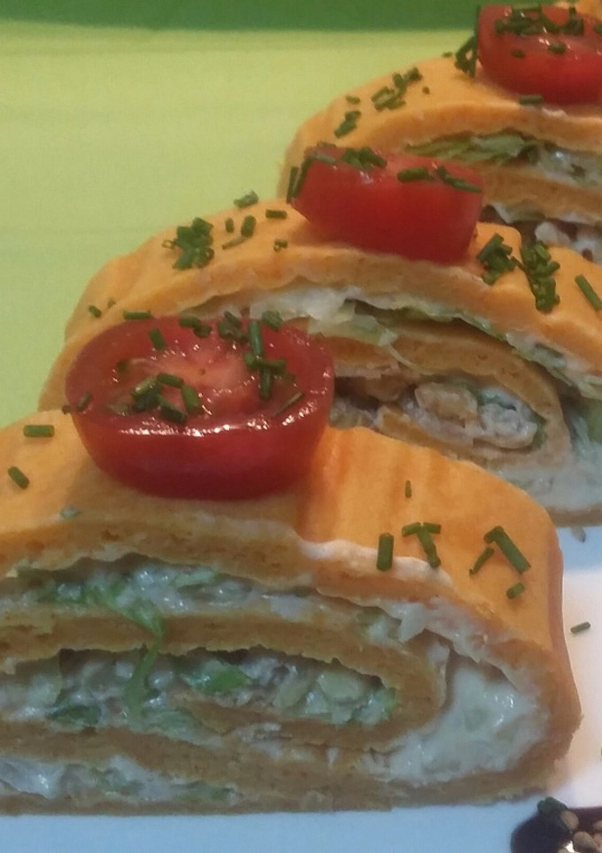 Una foto de Brazo salado con crema de queso y nueces