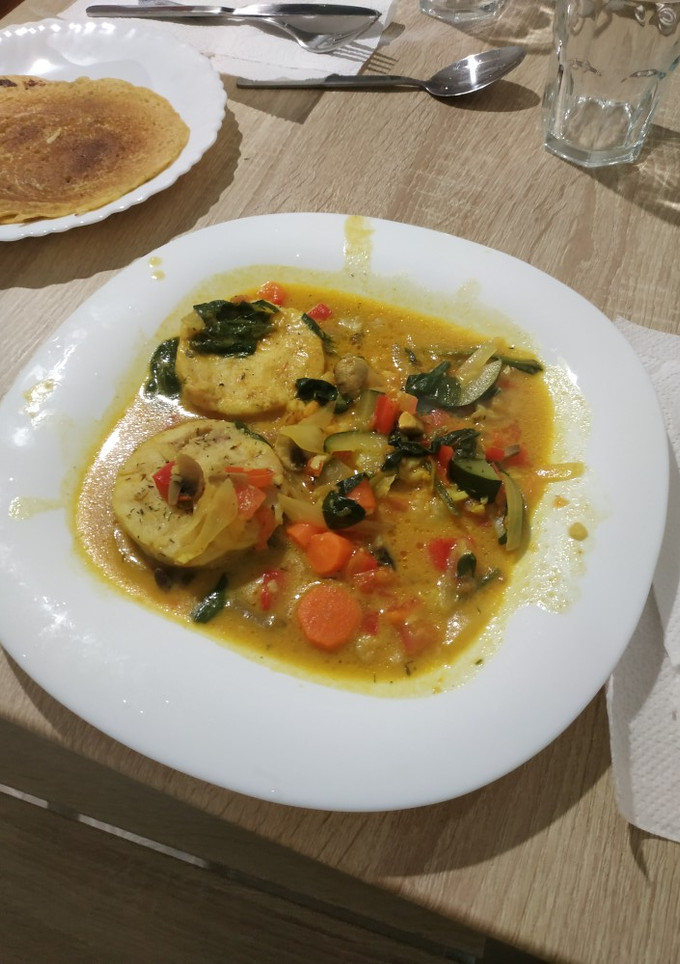 Una foto de Merluza en salsa de curry
