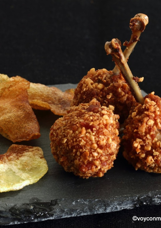 Una foto de Chupa-Chups de muslo de codorniz