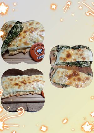 Una foto de Calzone de acelga, ricotta, verdeo y varios quesos