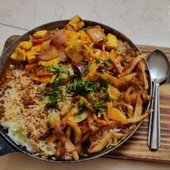 A picture of Paneer sizzler with Jeera Rice.