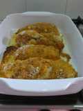 Rollitos de pechuga rellenos de jamón y queso al horno