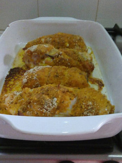 Una foto de Rollitos de pechuga rellenos de jamón y queso al horno