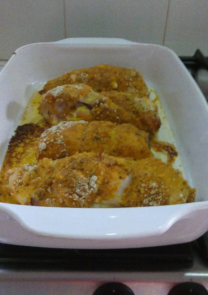 Una foto de Rollitos de pechuga rellenos de jamón y queso al horno