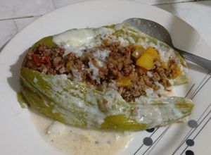 Una foto de Archucha o caigua rellena de carne