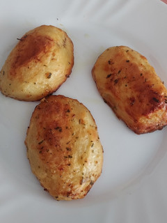 Una foto de Patatas horneadas a la parmesana