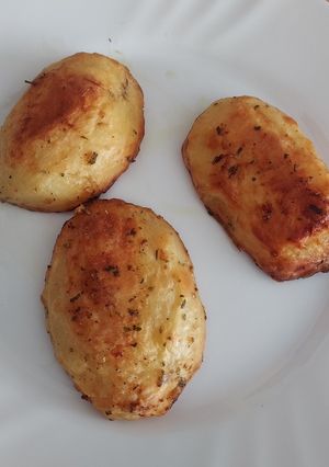 Una foto de Patatas horneadas a la parmesana