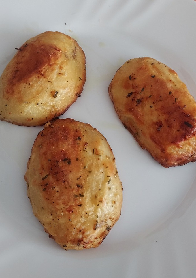 Una foto de Patatas horneadas a la parmesana