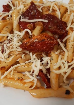 Una foto de Macarrones con tomate seco