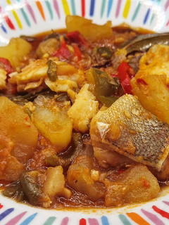 Una foto de Patatas con bacalao con pimientos