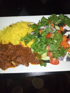 A picture of Basmati Rice cooked in turmeric.