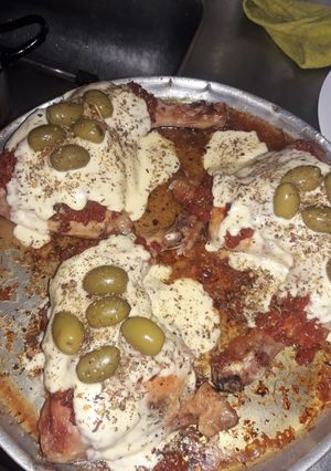 Una foto de Pata y muslo a la pizza 🍗🍕