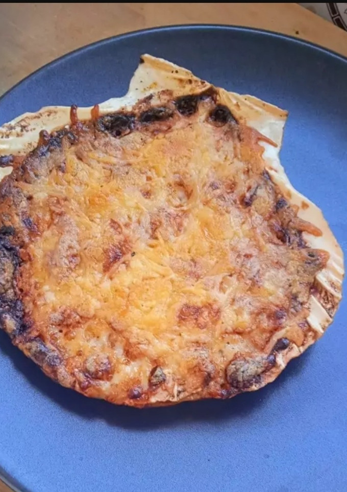 Una foto de Vieiras rellenas de bogavante y rape