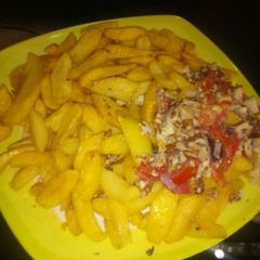 A picture of Irish potatoes chips with scramble eggs.