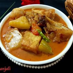 A picture of Katla fish with baby pumpkin/ kochi kumdo diye katla machher jhol.