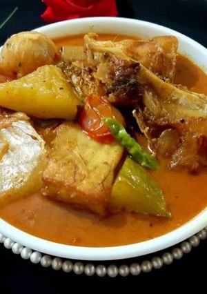 A picture of Katla fish with baby pumpkin/ kochi kumdo diye katla machher jhol.