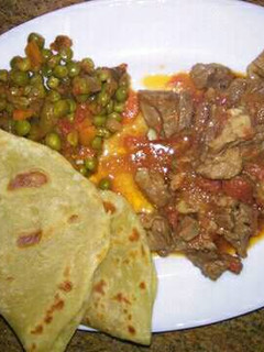 A picture of Chapati and minji with beef stew.
