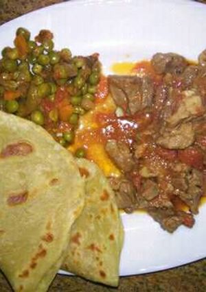 A picture of Chapati and minji with beef stew.