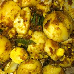 A picture of Egg fry with pepper and garlic.