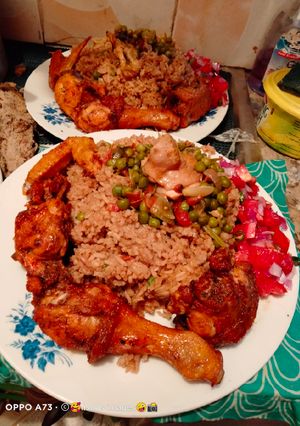 A picture of Fried chicken and rice.
