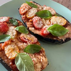 A picture of Baked Eggplant w Tomato/Parmesan.