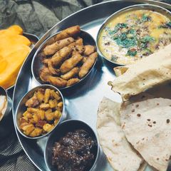 A picture of Arbi,Aalu ki sabji or Pili Moong Dal,and Aalu arbi khatai.
