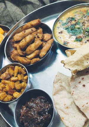 A picture of Arbi,Aalu ki sabji or Pili Moong Dal,and Aalu arbi khatai.
