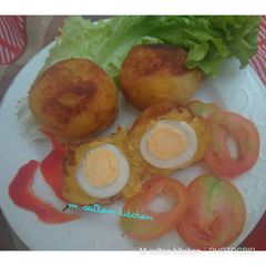 A picture of Plantain Scotch egg.