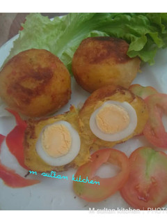 A picture of Plantain Scotch egg.