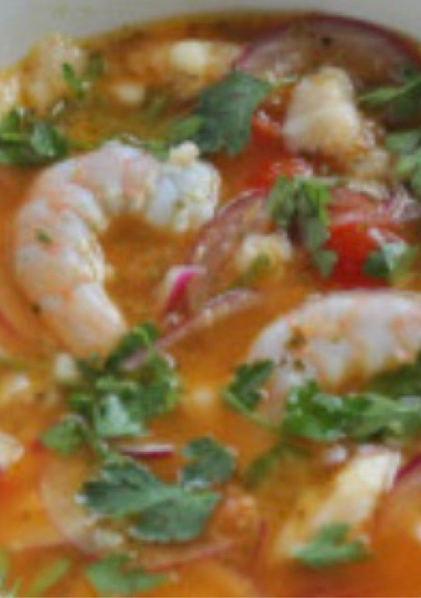 Una foto de Ceviche de lubina y langostinos