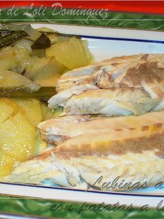 Una foto de Lubinas a la sal con patatas a lo pobre