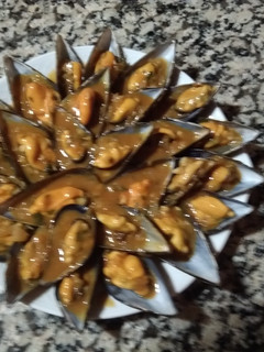 Una foto de Mejillones en salsa marinera