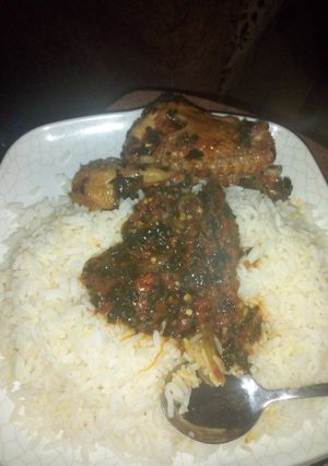 A picture of White rice with miyar ugu.