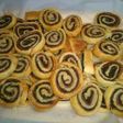 Girelle di pasta sfoglia ruccola pancetta prosciutto salame ecc