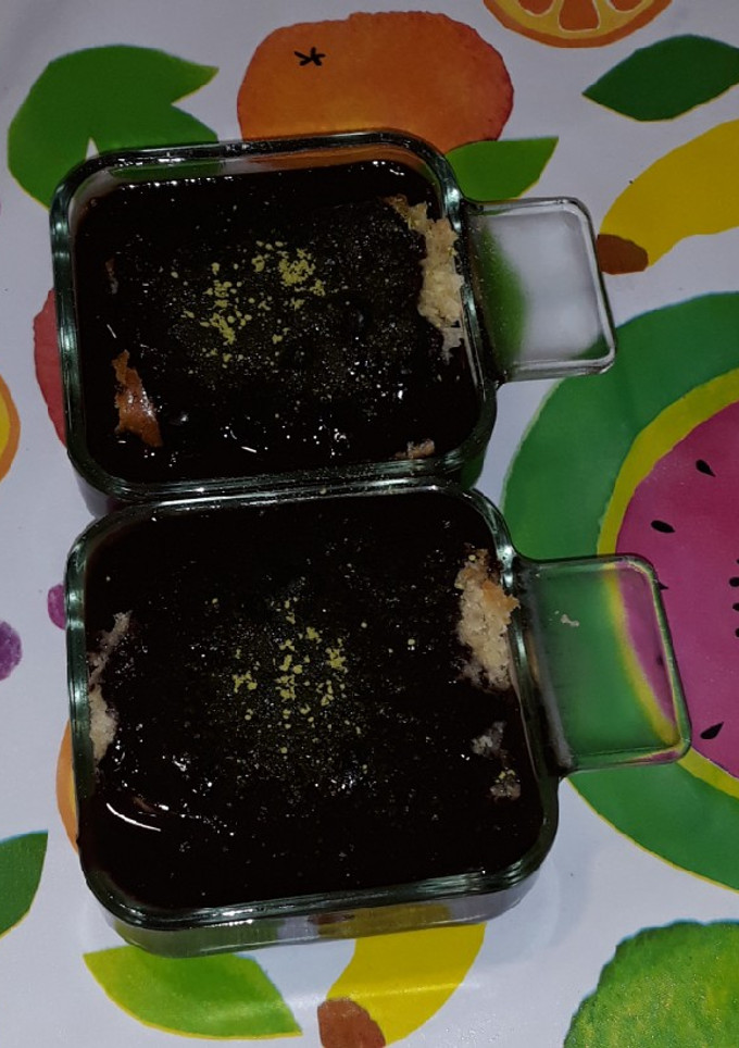 Una foto de Bizcocho a la naranja con chocolate a la canela, miel y té matcha