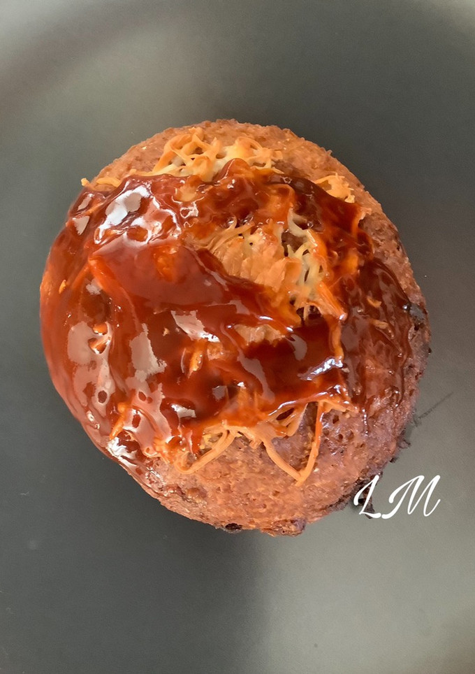 Una foto de Bomba de patata rellena de carne