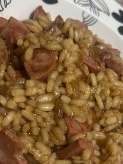 Foto de Risoto de Cerveja Preta com Linguiça