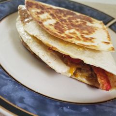 A picture of Flaming Hot taco crunch wrap.