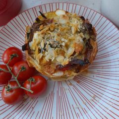 A picture of Simple Mini quiche with roasted veg and feta.