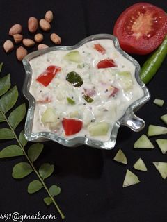 કાકડી ટામેટાંનું રાયતું રેસીપી મુખ્ય ફોટો