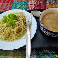 A picture of Pasta-Broccoli Pesto Pasta& vegetable clear soup.